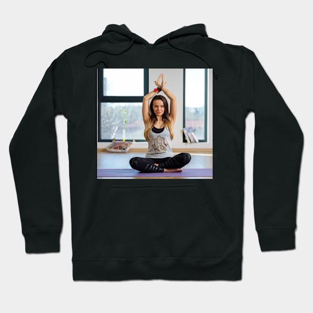 Woman in various yoga postures Hoodie by naturalis